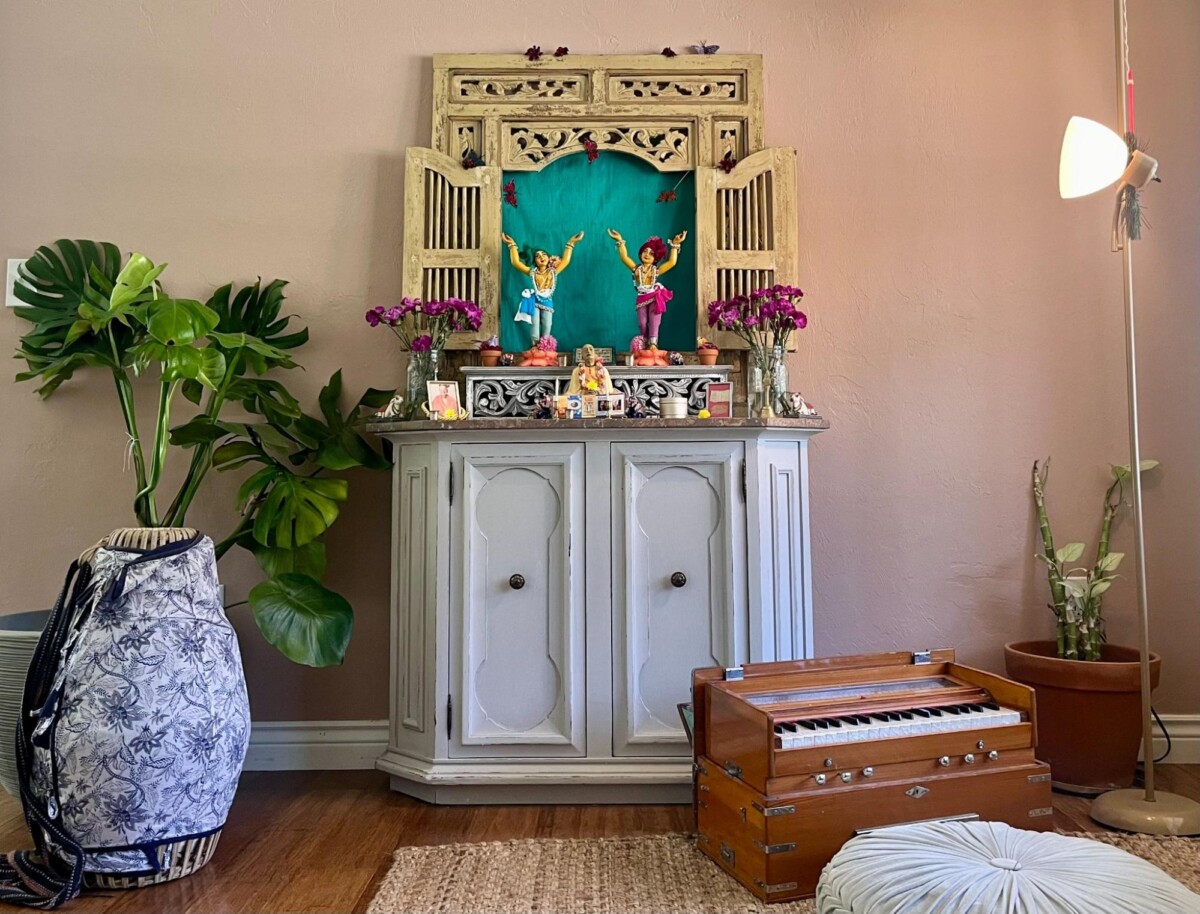 Icons of Chaitanya and Nityananda stand as the focal point of a home mandir.