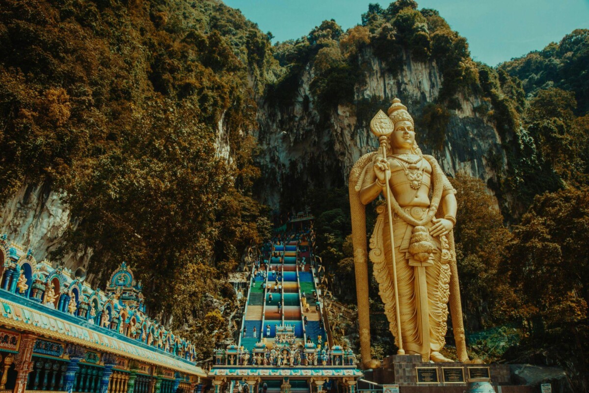 Standing near the entrance of the Batu Caves, the statue of Murugan towers at 140 feet, humbling devotees with his awe-inspiring presence.